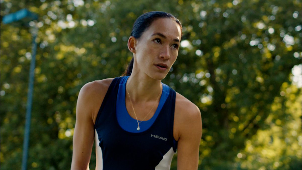 Every Sport a Bowling Ball - lady playing tennis with a bowling bowl