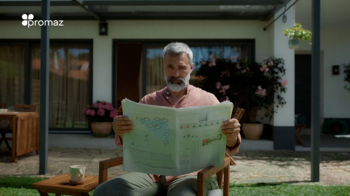 Promaz - man reading a newspaper in his garden